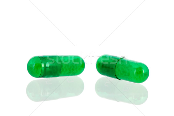 Green medicine in capsules Stock photo © ivonnewierink