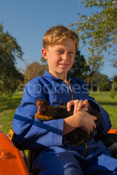Farm Boy with tractor Stock photo © ivonnewierink