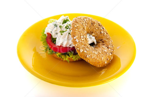 Bagel krém sajt gyógynövények tányér friss Stock fotó © ivonnewierink