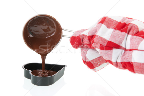 Mucegai ciocolată inimă mână bomboane Imagine de stoc © ivonnewierink