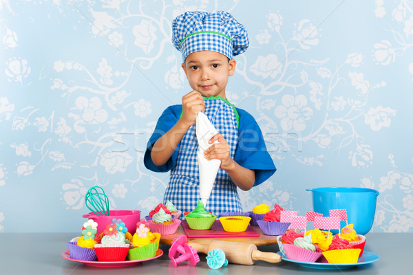 Little boy baking cupcakes Stock photo © ivonnewierink