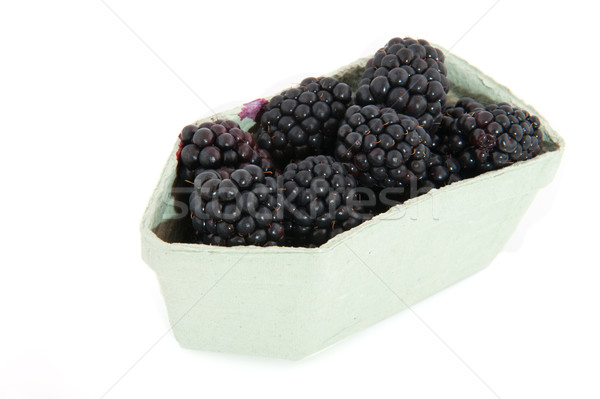 Blackberries in carton Stock photo © ivonnewierink