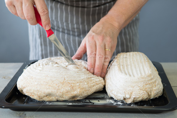 Scoring bread dough Stock photo © ivonnewierink