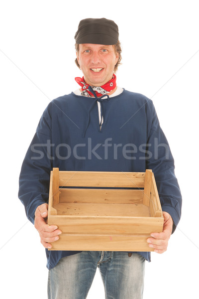 Farmer with crate isolated over white background Stock photo © ivonnewierink