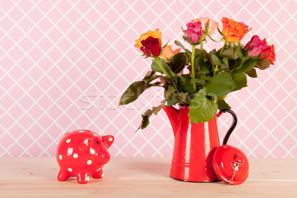 Colorful bouquet roses and piggy bank Stock photo © ivonnewierink