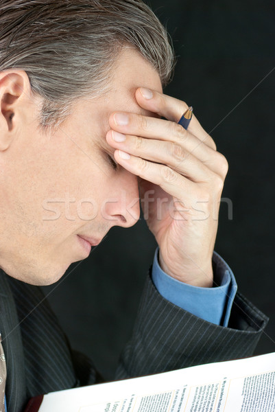 Businessman Stresses Over Document Stock photo © jackethead