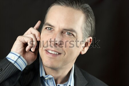 Boldog üzletember kabát váll közelkép tart Stock fotó © jackethead