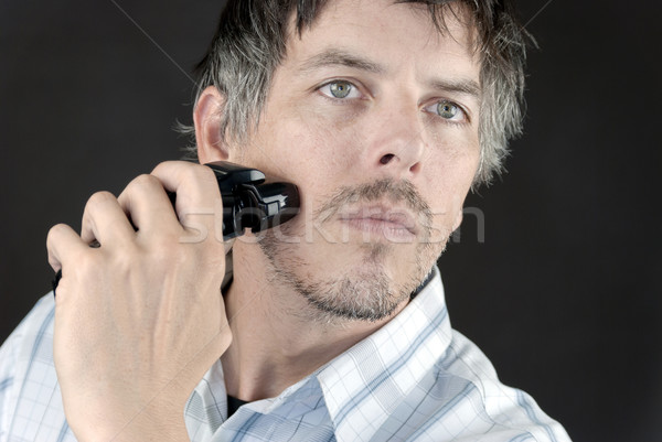 Férfi közelkép kecskeszakáll elektromos borotva arc Stock fotó © jackethead