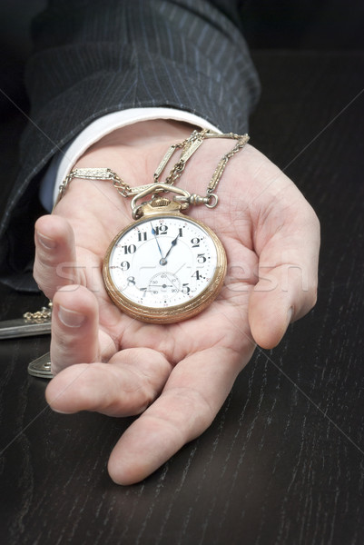 Businessman Displying Pocketwatch Stock photo © jackethead
