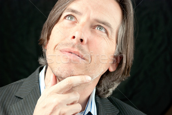 üzletember felfelé néz közelkép üzlet arc portré Stock fotó © jackethead