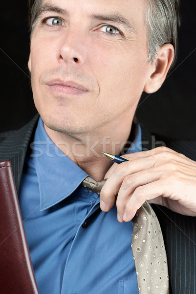 Hangsúlyos üzletember nyakkendő közelkép arc szemek Stock fotó © jackethead