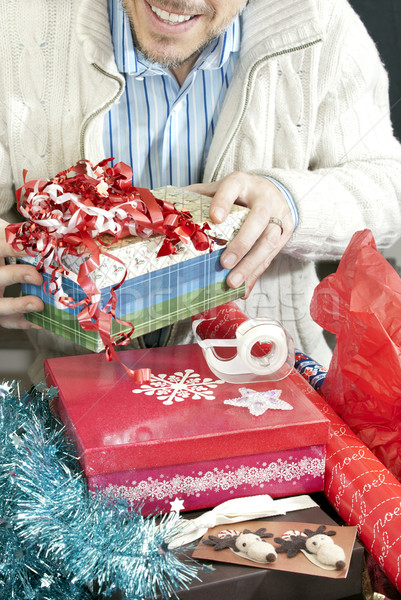 笑みを浮かべて 男 ラッピング プレゼント クローズアップ クリスマス ストックフォト © jackethead