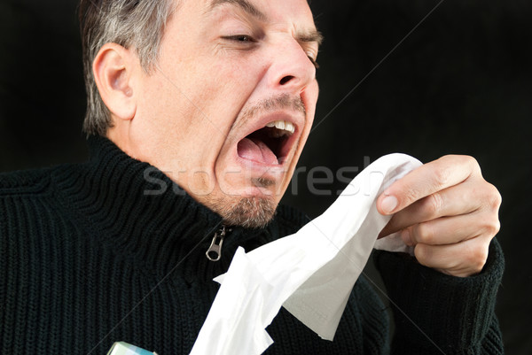 Férfi közelkép húz papírzsebkendő ki doboz Stock fotó © jackethead