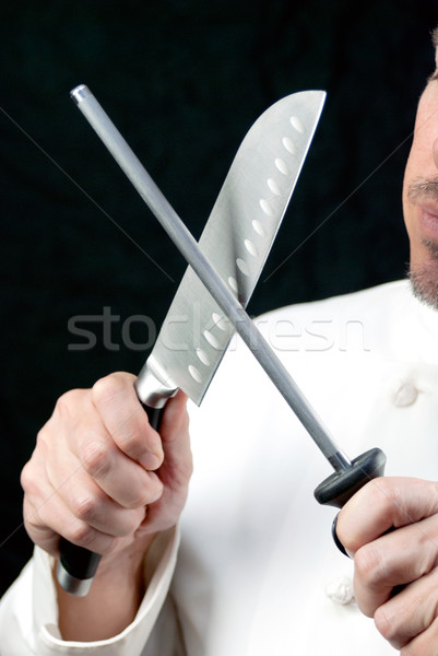 Chef Sharpens Knife, Side Stock photo © jackethead