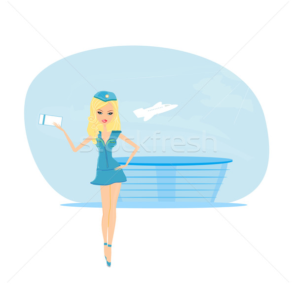 Beautiful stewardess with ticket on airport Stock photo © JackyBrown