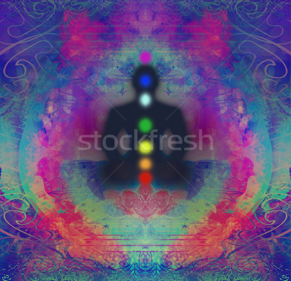 Yoga lotus pose. Padmasana with colored chakra points.  Stock photo © JackyBrown