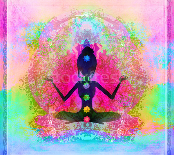  Yoga lotus pose. Padmasana with colored chakra points.  Stock photo © JackyBrown