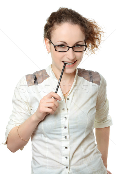Fiatal csinos nő szemüveg ceruza készít döntés Stock fotó © jagston