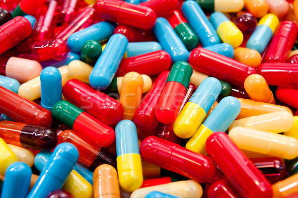 Various colorful capsules Stock photo © jakatics