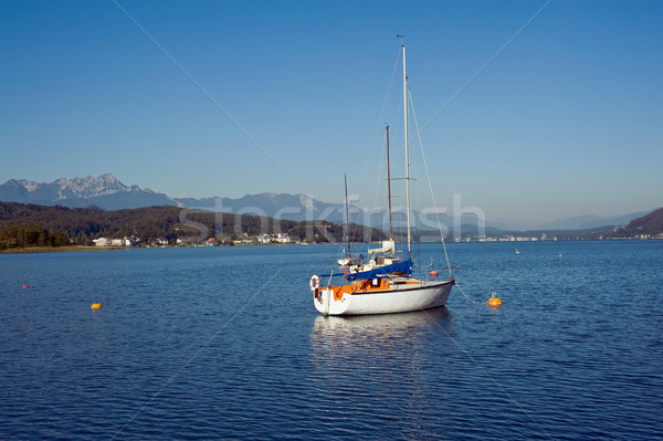 Barche a vela lago foresta sport blu colore Foto d'archivio © jakatics