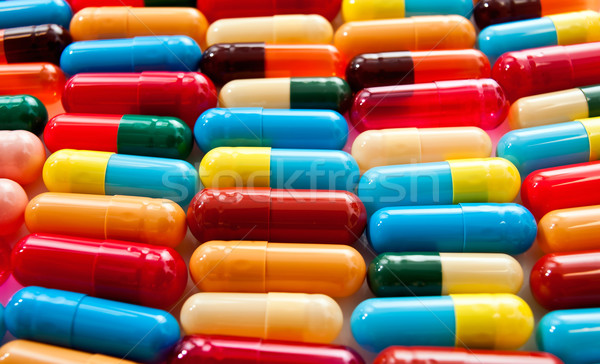 Mixed colorful capsules Stock photo © jakatics