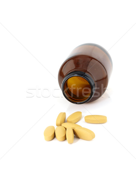 Witamina c pigułki butelki brązowy medycznych Zdjęcia stock © jakgree_inkliang