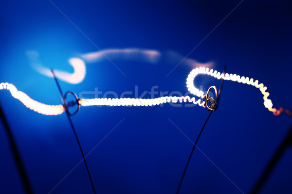Volfrám villanykörte közelkép elektromos lámpa fekete Stock fotó © janaka