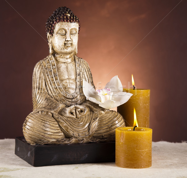 Buddha with candle Stock photo © JanPietruszka