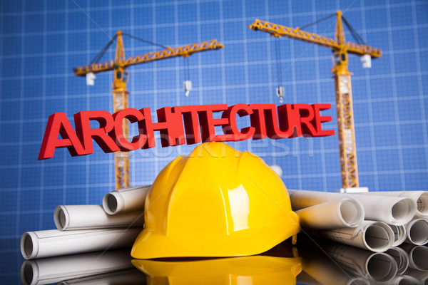 Crane, Safety helmet, Blueprints and construction site Stock photo © JanPietruszka
