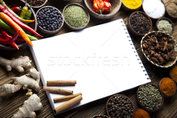 Cookbook and various spices, orintal cuisine vivid theme Stock photo © JanPietruszka