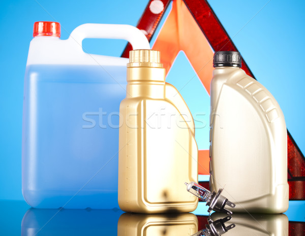 Stock photo: Canisters, Liquids for car on vivid moto concept