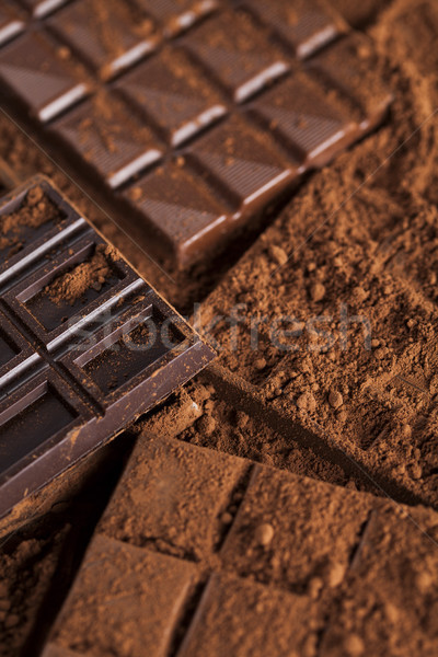 Dark homemade chocolate bars and cocoa pod on wooden  Stock photo © JanPietruszka