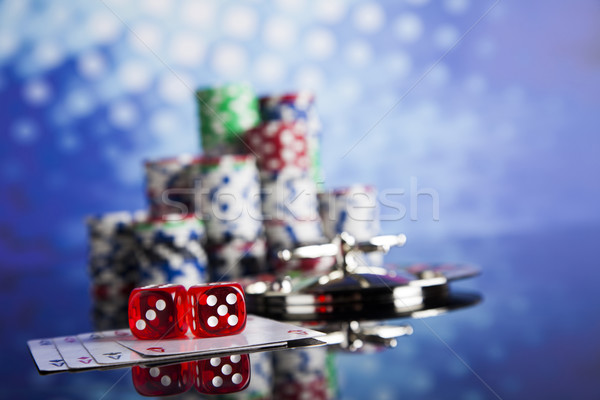 Poker Chips on a gaming with casino roulette Stock photo © JanPietruszka