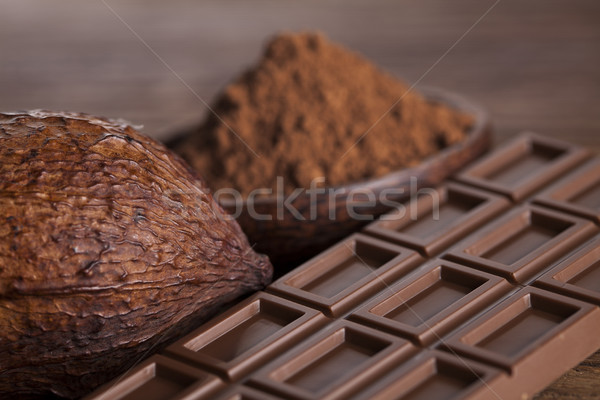 Chocolate bar, candy sweet, dessert food on wooden background Stock photo © JanPietruszka