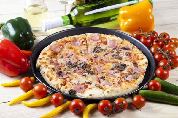 Supreme pizza in pan, tasty natural food theme Stock photo © JanPietruszka