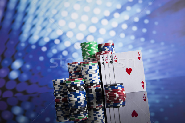 Poker Chips on a gaming with casino roulette Stock photo © JanPietruszka