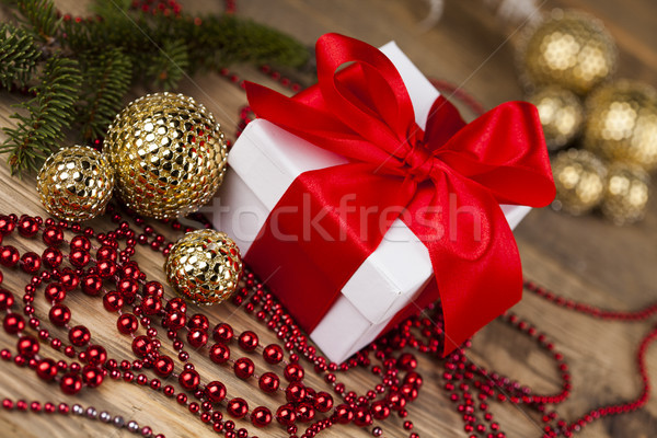 Beautiful gift box with red ribbon on Christmas background Stock photo © JanPietruszka