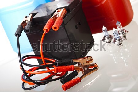 Car battery with two jumper cables clipped on vivid moto concept Stock photo © JanPietruszka
