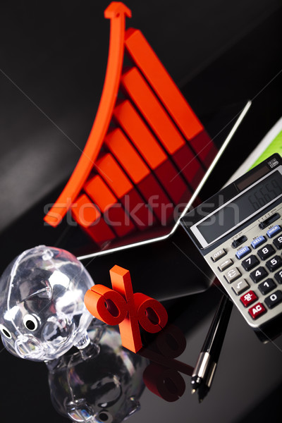 Financial graph on tablet with calculator   Stock photo © JanPietruszka