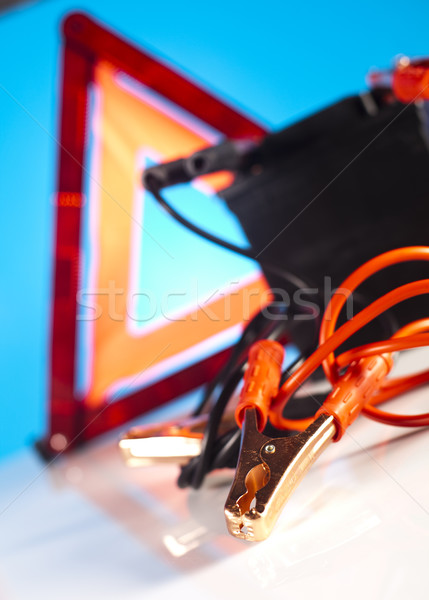 Car battery with two jumper cables clipped on vivid moto concept Stock photo © JanPietruszka