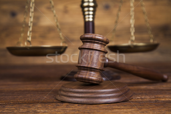 Law theme, mallet of the judge, wooden desk background Stock photo © JanPietruszka