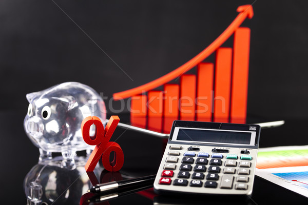 Financial graph on tablet with calculator   Stock photo © JanPietruszka