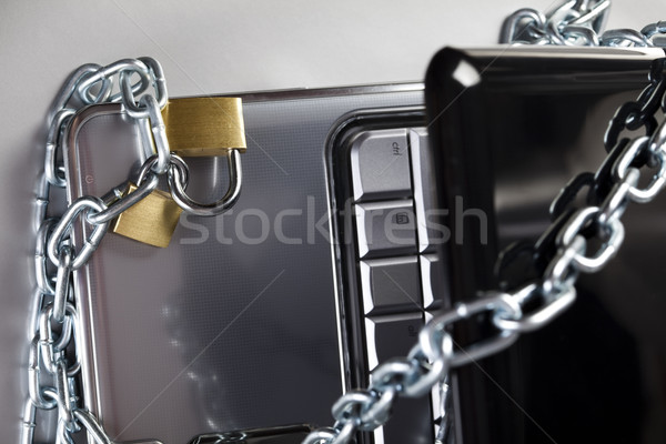 Locked mobile computer, modern network symbols concept Stock photo © JanPietruszka
