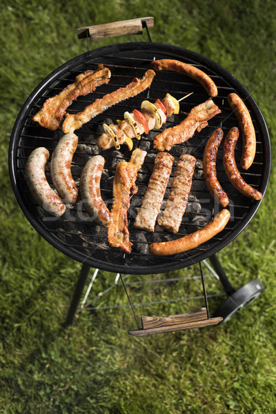 Grill with red hot briquettes, fire background Stock photo © JanPietruszka