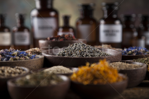Medicine bottles and herbs background Stock photo © JanPietruszka