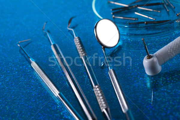 Dentist equipment on blue background Stock photo © JanPietruszka