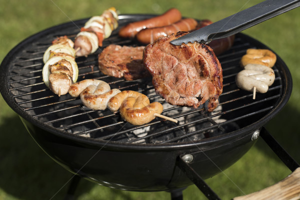 Grill with red hot briquettes, fire background Stock photo © JanPietruszka