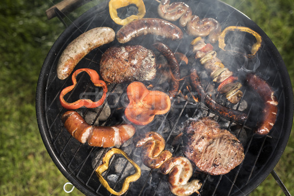 Grill with smoke over summer outdoor nature in garden Stock photo © JanPietruszka