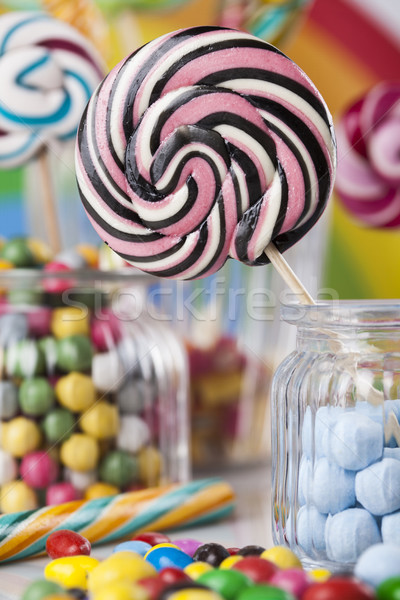 Colorful candies in jars on table on gum balls Stock photo © JanPietruszka