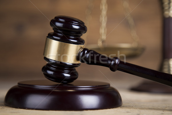 Law theme, mallet of the judge, wooden desk background Stock photo © JanPietruszka